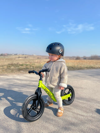 Why is it best to start with a balance bike rather than a tricycle?