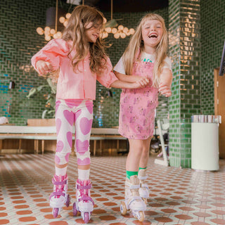 A child wearing adjustable inline skates